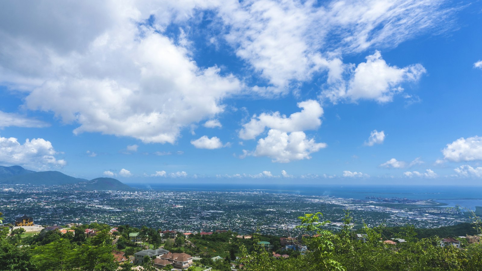 Aerial view of Kingston, Jamaica, from the hills above Red Hills Road, with Kingston Harbour on the horizon